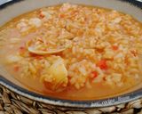 Foto del paso 11 de la receta: Arroz caldoso con sepia, almejas y gambones