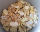 A picture of step 1 of Cheesy Roasted Squash and Onion.