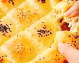 صورة لخطوة 12 من وصفة خبز البيدا التركي هش و خفيف مثل القطن🍞
