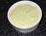 A picture of step 2 of Tostones (Patacones) with Green Garlic Sauce.