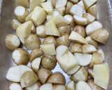A picture of step 1 of Greek burgers with potatoes.
