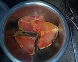 A picture of step 4 of Aloo fulcopi katla rosha ar misti doi.