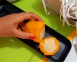 A picture of step 9 of Stuffed mango malai kulfi.