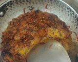 A picture of step 4 of Smokey tandoori chicken drumsticks biryani with mint mango raita.