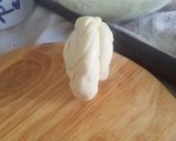 A picture of step 6 of White chapati (oiled thrice and rolled out twice).