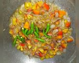 A picture of step 4 of Spicy daal karela.