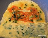 A picture of step 8 of Scallion and Wakame Tamagoyaki.