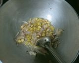 A picture of step 2 of Masala Corn Rice.