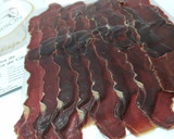 Foto del paso 1 de la receta: Rollitos de cecina con germinados y sirope de membrillo sobre tierra de aceitunas negras y aceite aromatizado de romero