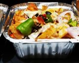 A picture of step 8 of Chessy pizza fries.