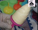 A picture of step 6 of Custard popsicles.