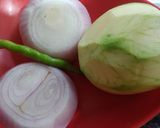 A picture of step 1 of Raw mango, onion bhaji.