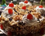 A picture of step 12 of Black forest cake stuff California crunchy walnuts cake.