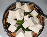 A picture of step 3 of Achari paneer tikka with achari onion rings.