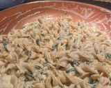 A picture of step 4 of Pork chops with lemon garlic and spinach cream pasta.