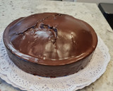Foto del paso 11 de la receta: Bizcocho de leche condensada y cacao con cobertura de chocolate