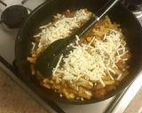 A picture of step 8 of Sausage corn macaroni pasta.