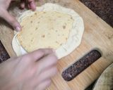 A picture of step 8 of Jain Cheese burst pizza.