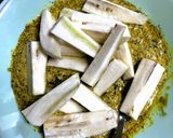 A picture of step 2 of Lau Patay Kacha Kolar Paturi (Raw Banana steam cooked in Bottle Gourd Leaves - Bong style).