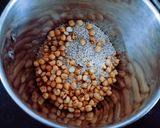 A picture of step 2 of Protein rich healthy roasted chana dal chopped dry fruit and sesame seeds ladoo.