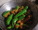 A picture of step 4 of Dana Methi stuffed Mirchi.