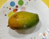 A picture of step 4 of Ice cream loaded mango.
