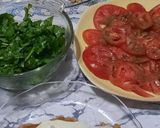 Foto del paso 7 de la receta: Milanesas al horno con mozzarella y queso azul - rúcula y tomates