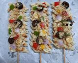A picture of step 3 of Penne pasta pizza sticks.