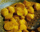 A picture of step 5 of Masala baby potatoes.