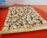 Foto del paso 3 de la receta: Pionono relleno con Banana, Chips de chocolate y Nuez