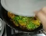 A picture of step 4 of Masala potatoes slices.