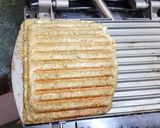 A picture of step 8 of Pesarettu Coleslaw Sandwich.