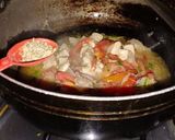 A picture of step 11 of Tikka chicken macroni.