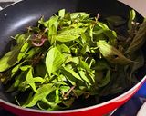 A picture of step 4 of Eggplant and King Oyster Mushrooms Stir-Fried with Basil.