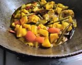 A picture of step 5 of Pumpkin Puri with mixed vegetable bhaji.