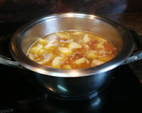 Foto del paso 7 de la receta: Patata estofada con costillas y picada