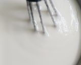 A picture of step 4 of Dahi Vada / Dahi Bhalla.