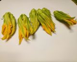 A picture of step 1 of Deep fried pumpkin flowers.