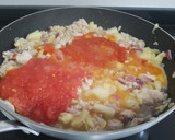 Foto del paso 3 de la receta: Calabacines rellenos con salsa semi boloñesa de pavo picado