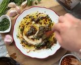 Foto del paso 3 de la receta: Aceite de oliva con ajo confitado y romero