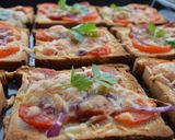 A picture of step 9 of Pizza Bread.