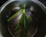 A picture of step 1 of Lemon grass & mint leaves tea.