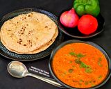 A picture of step 6 of Capsicum-Onion Curry in a Yogurt-Based Red Gravy.