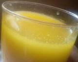 A picture of step 7 of Turmeric and ginger juice with clove and honey.