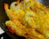 A picture of step 2 of Chingri macher malai curry.