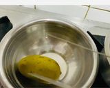A picture of step 1 of Aam Ka Khatta Meetha Pana.