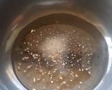 A picture of step 4 of Moong Dal Halwa Cigars dipped in Shaahi Rabdi.