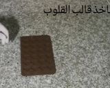 صورة لخطوة 10 من وصفة صابلي القلوب بحشو جوز الهند والحليب المركز