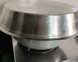A picture of step 6 of Banana suji cake (eggless, on stove).