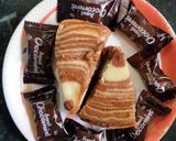 A picture of step 8 of Zebra Chocolate Vanilla Marble Cake.